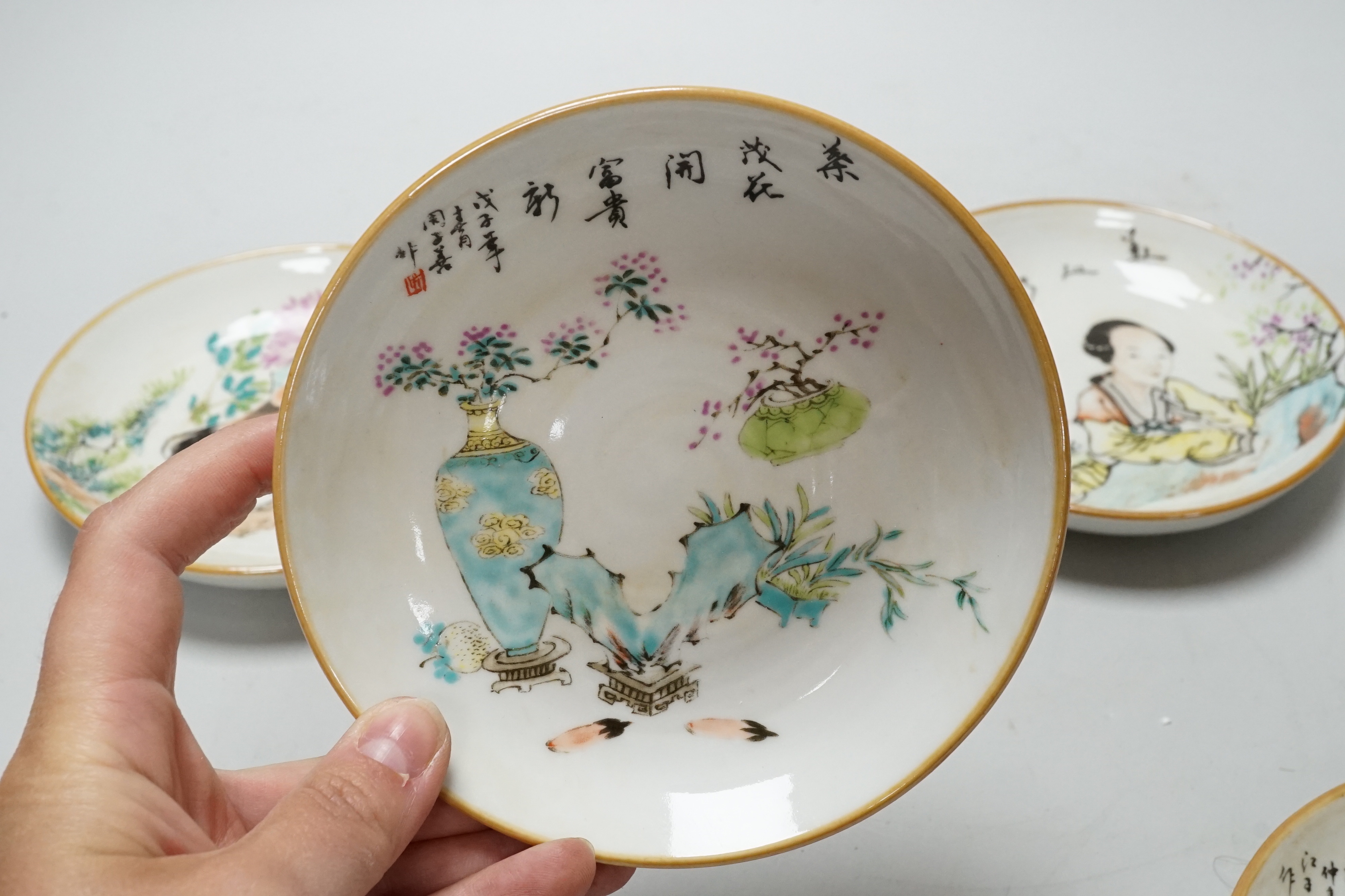 A set of four Chinese saucer dishes, 13cm diameter